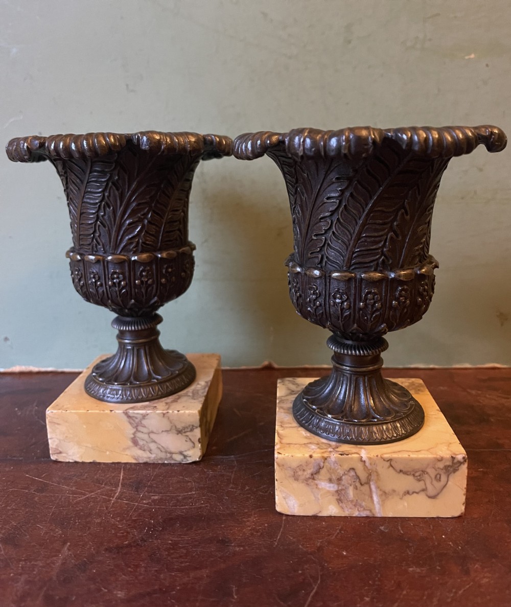 finely cast pair of early c19th smallscale bronze classical campanashaped vases on giallo di siena marble block bases