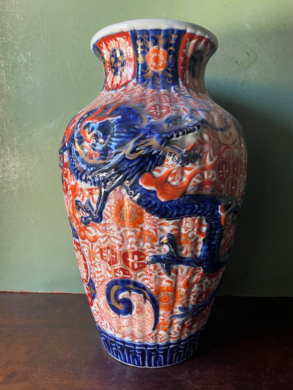 LATE C19TH JAPANESE IMARI PORCELAIN BALUSTER VASE WITH RAISED HIGHRELIEF COILED DRAGON DECORATION late c19th japanese imari porcelain baluster vase with raised highrelief coiled dragon decoration