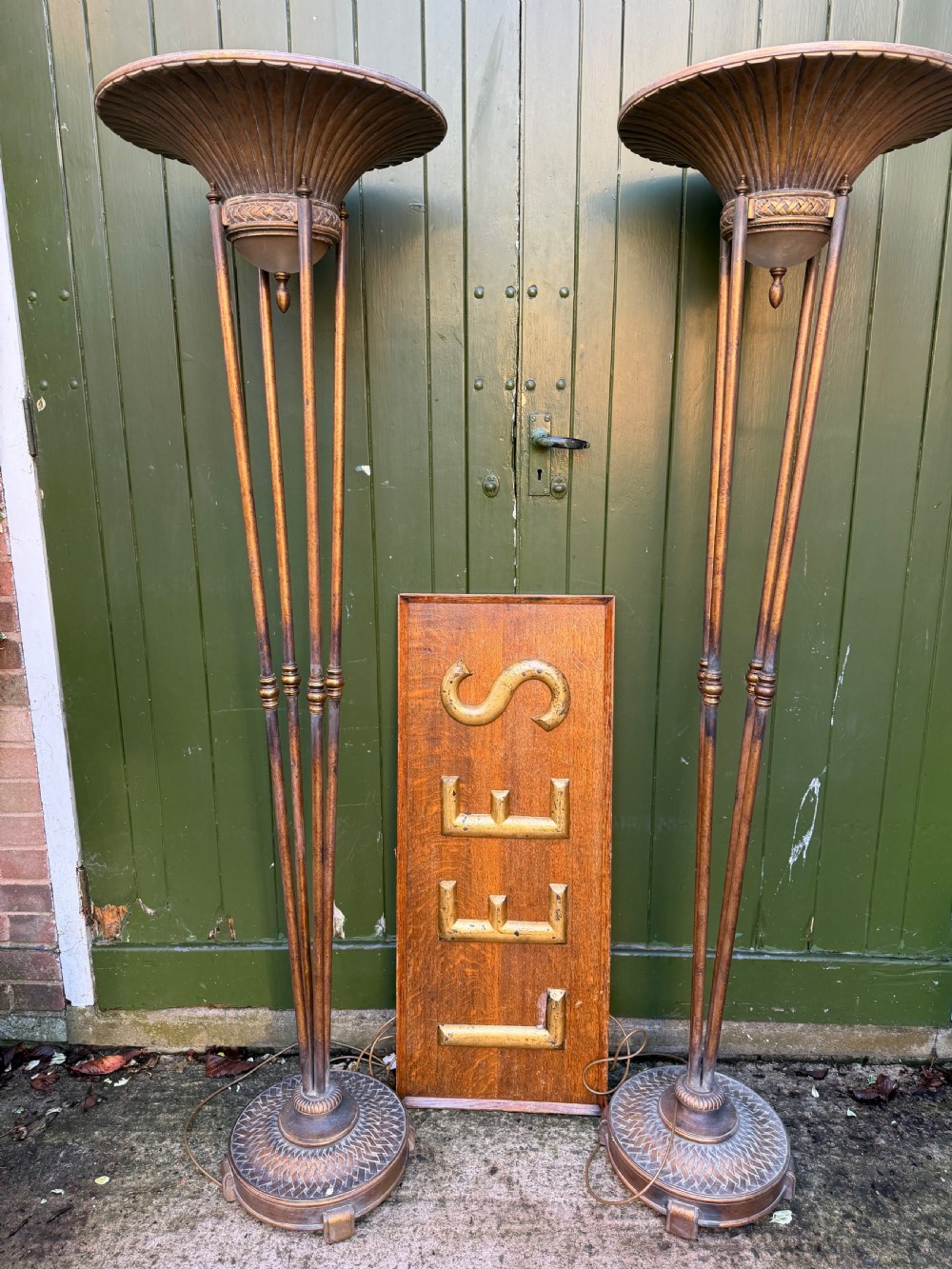 pair of early c20th gilt uplighters of hollywood regency or odeonesque design