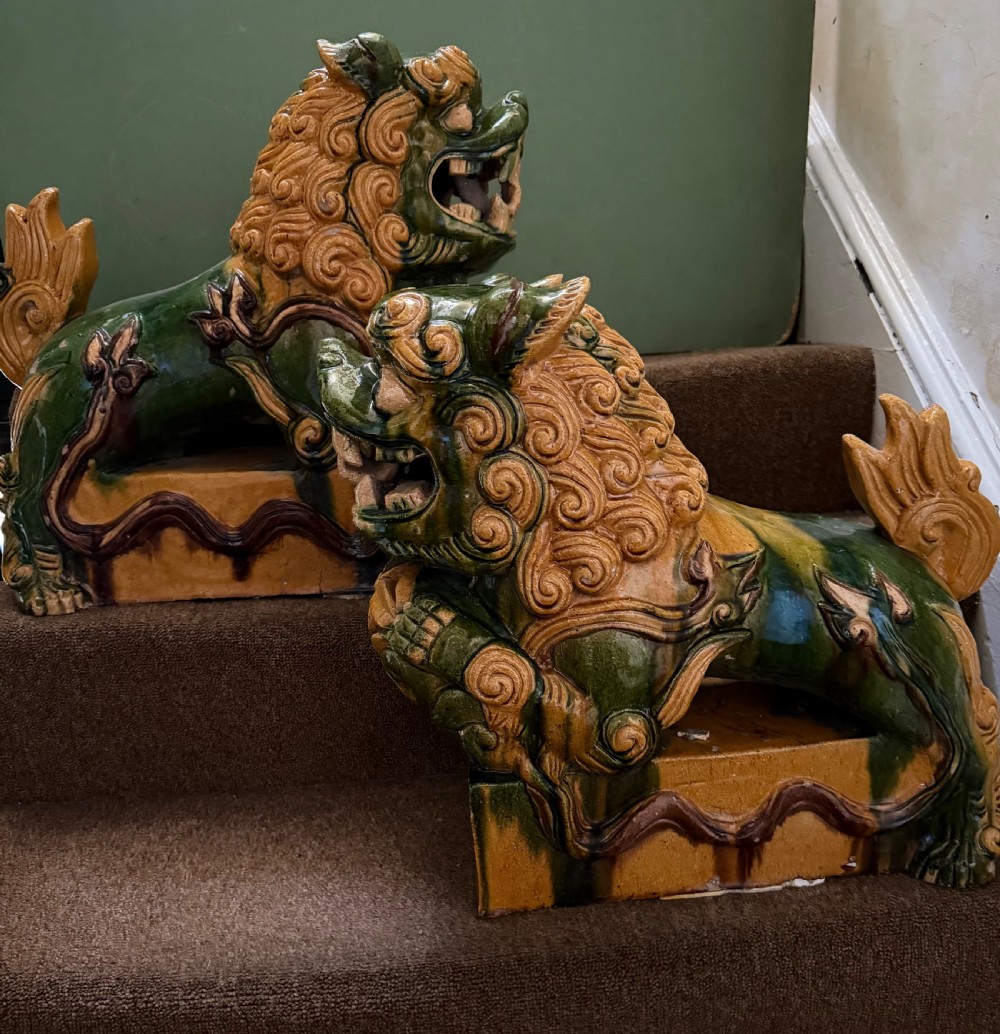 pair of largescale decorative early c20th chinese sancai glazed pottery foo dogs