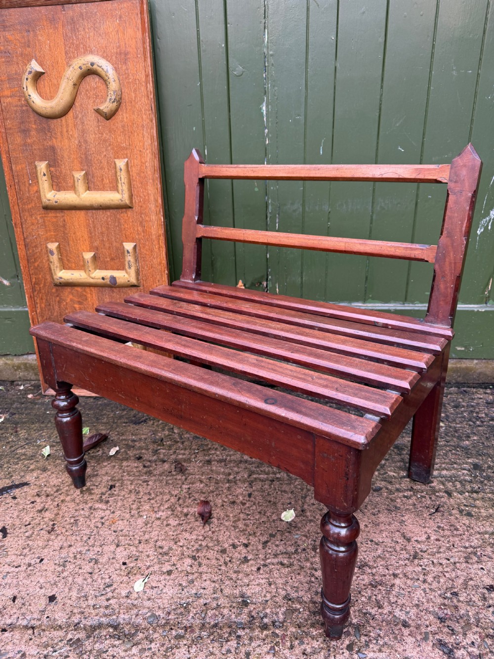 mid c19th mahogany countryhouse luggage stand of deep proportions with a raised and raked rear upstand support