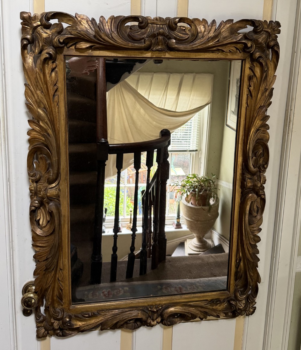 late c18th italian florentine design carved giltwood framed mirror of larger scale and proportions