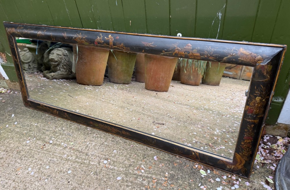 decorative and atmospheric c19th japanned lacquer cushionframed overmantel mirror in the late c17th early c18th taste