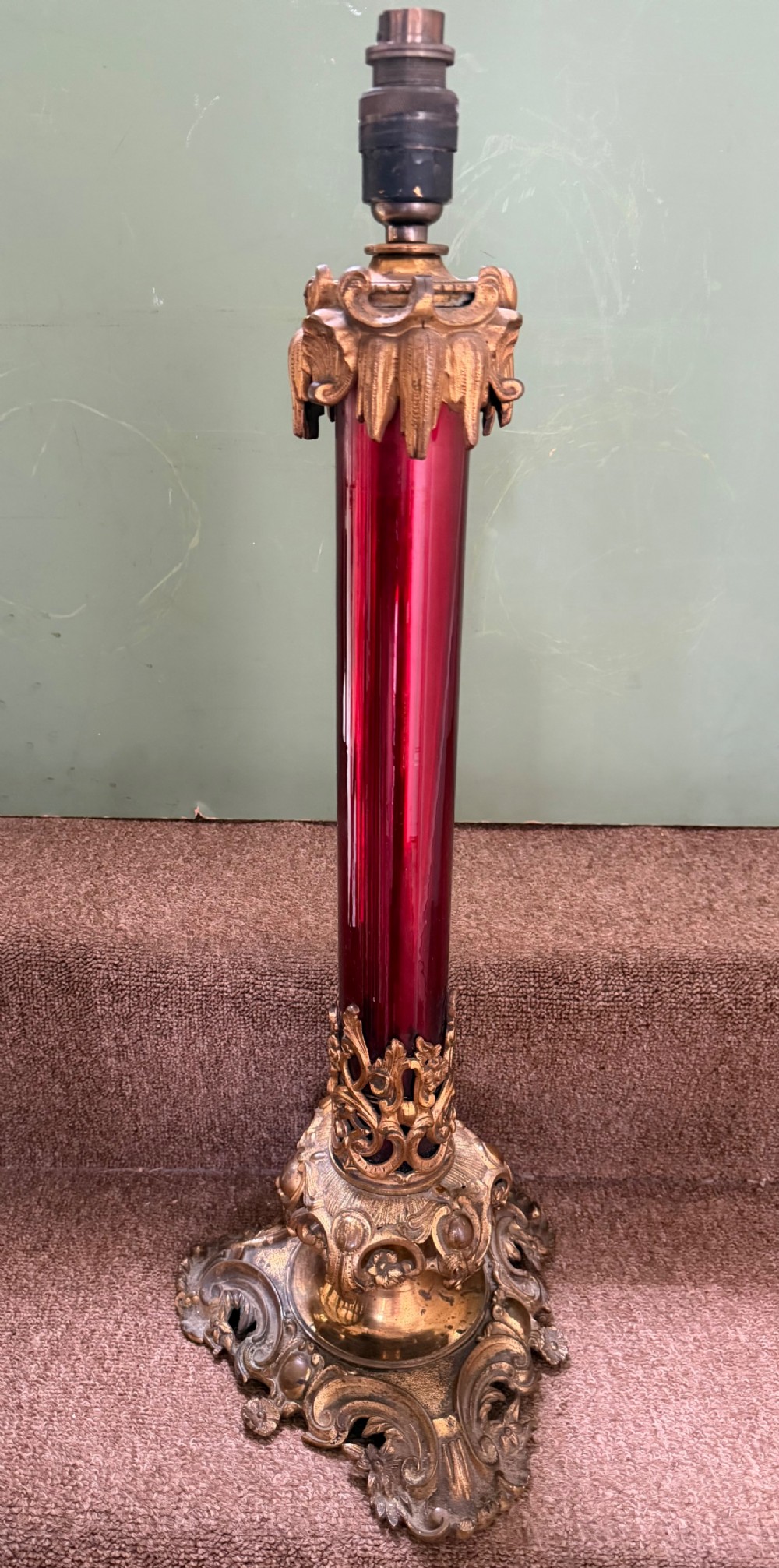 a flamboyant mid c19th ormolumounted red enamel glassbodied lamp