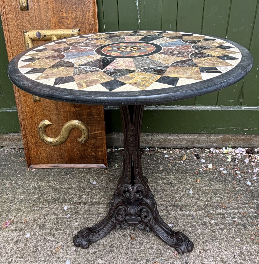 mid c19th circular inlaid specimen marble table top on original bronzed castiron base