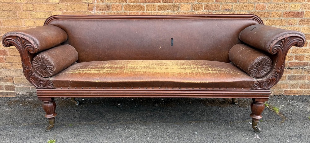 early c19th william iv period mahogany framed settee of bold design and scale