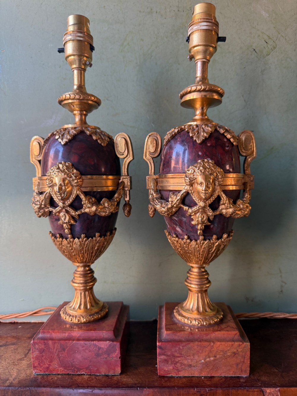 pair of late c19th french ormolumounted rouge marble lamps in the c18th louis xvi period style