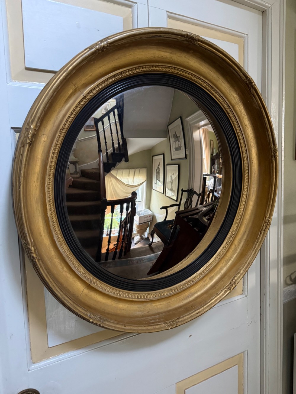 early c19th regency period circular giltframed convex plate mirror of bold scale and proportions